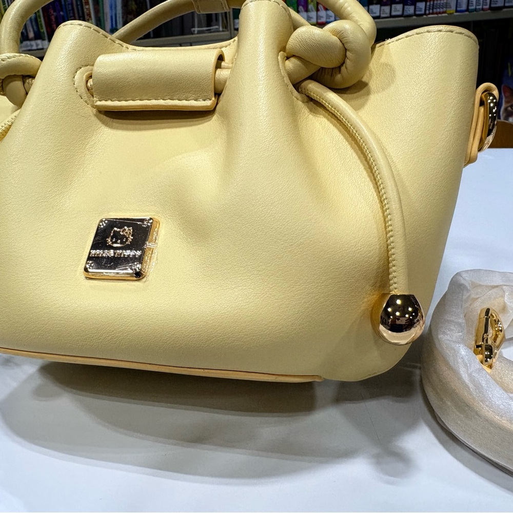 Hello Kitty Yellow Drawstring Crossbody Leather Tote - Picture 3 of 15